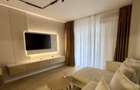 Apartament cu 2 camere decomandat în Popești-Leordeni - 1
