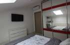 Apartament cu 3 camere semidecomandat în București - 10