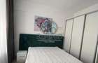 Apartament cu 2 camere decomandat în Popești-Leordeni - 1
