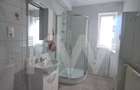 Apartament modern cu 2 camere, curte privată și 2 locuri de parcare