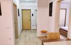 Apartament cu 2 camere semidecomandat, mobilat în Tractorul - 8