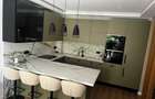 Apartament cu gradina propie