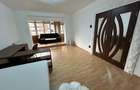 Inchiriez apartament cu 2 camere decomandat str Magheru etaj 1 - 3