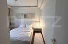 Apartament de lux,2 camere,2 băi,bloc nou,parter +parcare privată