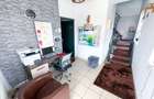 Spatiu comercial si locuin?a DE VANZARE, str. C.F.R - 12