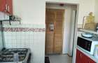 Vand in centru apartament 2 camere si loc de parcare in Buzau. Pret 55.800euro. - 2
