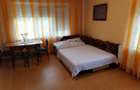 Inchiriez casa 2 camere 110mp cu curte 600 mp. - 1