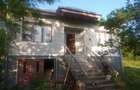casa 6 camere, parter inalt, beci+garaj,constructie 1995, incalzire centrala l teren intravilan 1,5h - 2