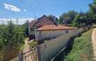 Casa in mediu rural cu teren