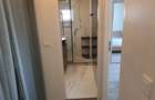 Dau spre inchiriere un apartament cu 2 dormitoare si living bucatarie open space - Calea Buziasului - 10