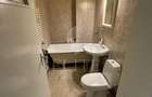 Apartament cu 3 camere semidecomandat în Central - 12