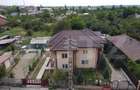 Casă cu 7 camere cu Teren 1500 Mp în Târgoviște - 1