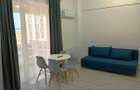 Apartament cu 2 camere decomandat în Popești-Leordeni - 2