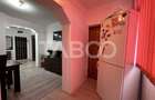 Apartament decomandat 3 camere 2 bai 68 mpu etaj 3 Calimanesti Valcea
