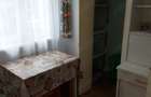 Apart 2 camere decomandate,etaj 1,centrala termica,balcon inchis,zona Profi Scoala 2 - 3