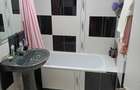 Apartament cu 4 camere decomandat în Central - 16