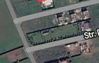 Vand teren Harman intre case cu gard