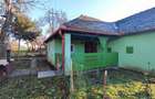 Casă cu 2 camere cu Teren 1323 Mp în Carei - 1