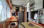 Apartament cu 2 camere decomandat în Popești-Leordeni - 12