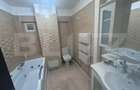 Apartament cu 2 camere, decomandat, centrala si AC, parter, cartier 1 Mai - 4