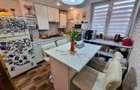 Apartament cu 4 camere semidecomandat în Onești - 1