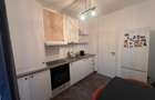 Inchiriez 2 camere, complet mobilat, utilat, parcare inclusa.