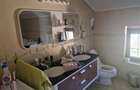 Vand casa Mandruloc constructie 2009 cu 450 mp utili pe 3.000 mp teren cu gazon si livada - 11