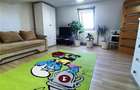 Apartament cu 4 camere decomandat în Tractorul - 48