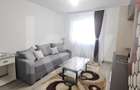 Apartament modern cu 2 camere, curte privată și 2 locuri de parcare
