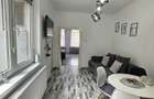 Apartament de vanzare cu terasa ?i beci, gata de utilizare
