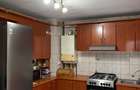 Casa de vanzare cu o suprafata construita de 205 metri patrati dispusa pe trei niveluri, demisol, parter si etaj.