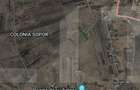 Teren intravilan 1072.5 mp Colonia Sopor, front de 46 ml la drum privat - 1