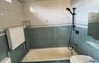 Apartament elegant cu 2 camere, loc de parcare ?i curte comuna Mara?ti