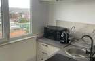 Dau in chirie apartament cu o camera, transformat in doua camere , are parcare subterana.