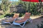 Casa cu 2 dormitoare, living si bucatarie open space, complet renovata si utilata, mobilata