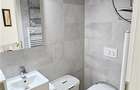 Apartament cu 3 camere decomandat în Tractorul - 10