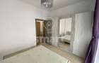 Apartament cu 3 camere semidecomandat în Central - 9