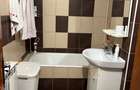 Inchiriez apartament elegant, 2 camere, decomandat Vaslui- inclusiv regim hotelier. - 9