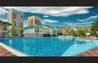 Apartament de inchiriat cu doua camere cu vedere la piscina in Cosmopolis - 1