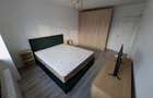 inchiriez apartament decomandat zona garii 3 camere 2 bai zona centrala - 1