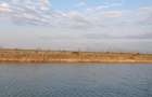 Vand 9 ha teren agricol cu 1,4 ha luciu apa