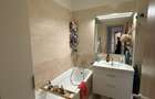 Apartament cu 3 camere decomandat, 2 bai, loc de parcare inclus