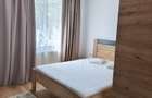 Inchiriezi apartament modern cu doua camere , complet mobilat si utilat - zona Coresi - 9