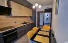 Apartament cu 2 camere decomandat în Tractorul - 4