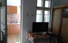 Vand casa individuala cu doua locuinte separate si curte, ideala pentru doua generatii - 10