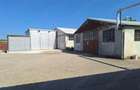 Proprietate industriala teren 4.150 mp + 3 hale renovate zona accesibila - 4