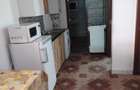 Inchiriez apartamente la casa.toate utilitatile,curte,centrala gaz. - 4