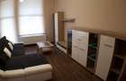 Inchiriez apartament ultracentral cu parcare in curte privata
