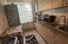 Apartament cu 3 camere decomandat în Tractorul - 2