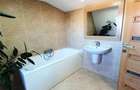 Apartament cu 4 camere decomandat în Tractorul - 50